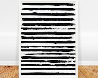 May include: Black and white abstract art print with horizontal brushstrokes. The print is framed in a white frame and has the text "KOLLI XO TRENDY PRINTS + POSTERS" at the bottom.