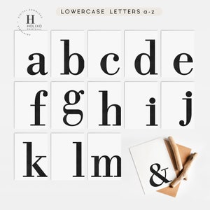 May include: A set of printable lowercase alphabet letters in a bold, black font on white cards. The letters are arranged in rows of five, with the ampersand symbol on a separate card. The letters are a, b, c, d, e, f, g, h, i, j, k, l, m, and the ampersand symbol.