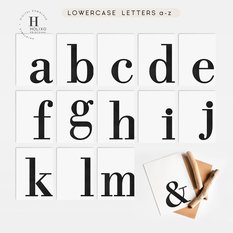 May include: A set of printable lowercase alphabet letters in a bold, black font on white cards. The letters are arranged in rows of five, with the ampersand symbol on a separate card. The letters are a, b, c, d, e, f, g, h, i, j, k, l, m, and the ampersand symbol.