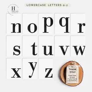 May include: Black and white lowercase alphabet letters printed on white cards. The letters are arranged in rows of four, with the last row having three letters. The letters are in a simple, bold font. A small thank you note is in the bottom right corner.