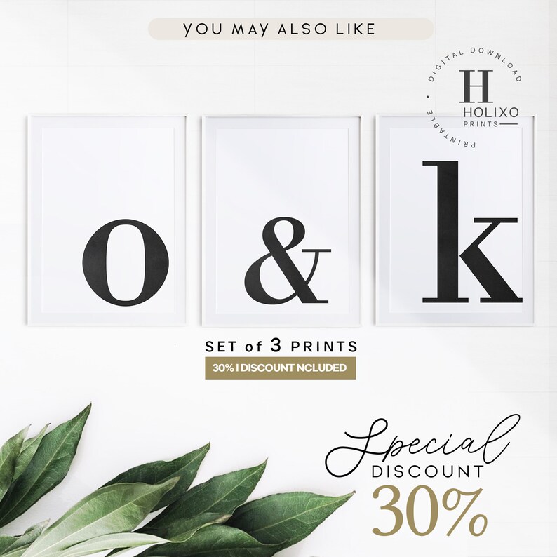 May include: Set of three printable wall art prints featuring the letters "o", "&", and "k" in a bold, black font. The prints are framed in white and displayed against a white background. The text "SET of 3 PRINTS" and "30% DISCOUNT INCLUDED" is also visible.