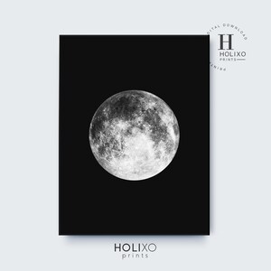 May include: A black and white image of the moon on a black background. The moon is full and has a detailed surface.
