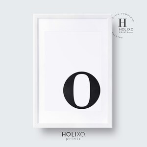 May include: A printable black and white poster featuring the letter "O" in a bold, sans-serif font. The letter is centered on a white background within a white frame.
