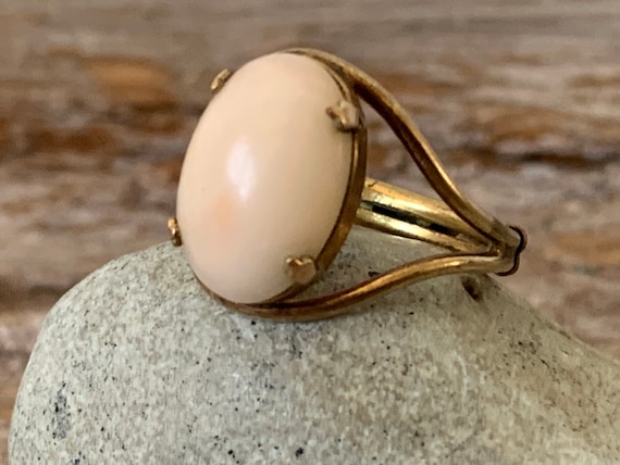 Vintage signed Burt Cassell angel skin coral ring,
