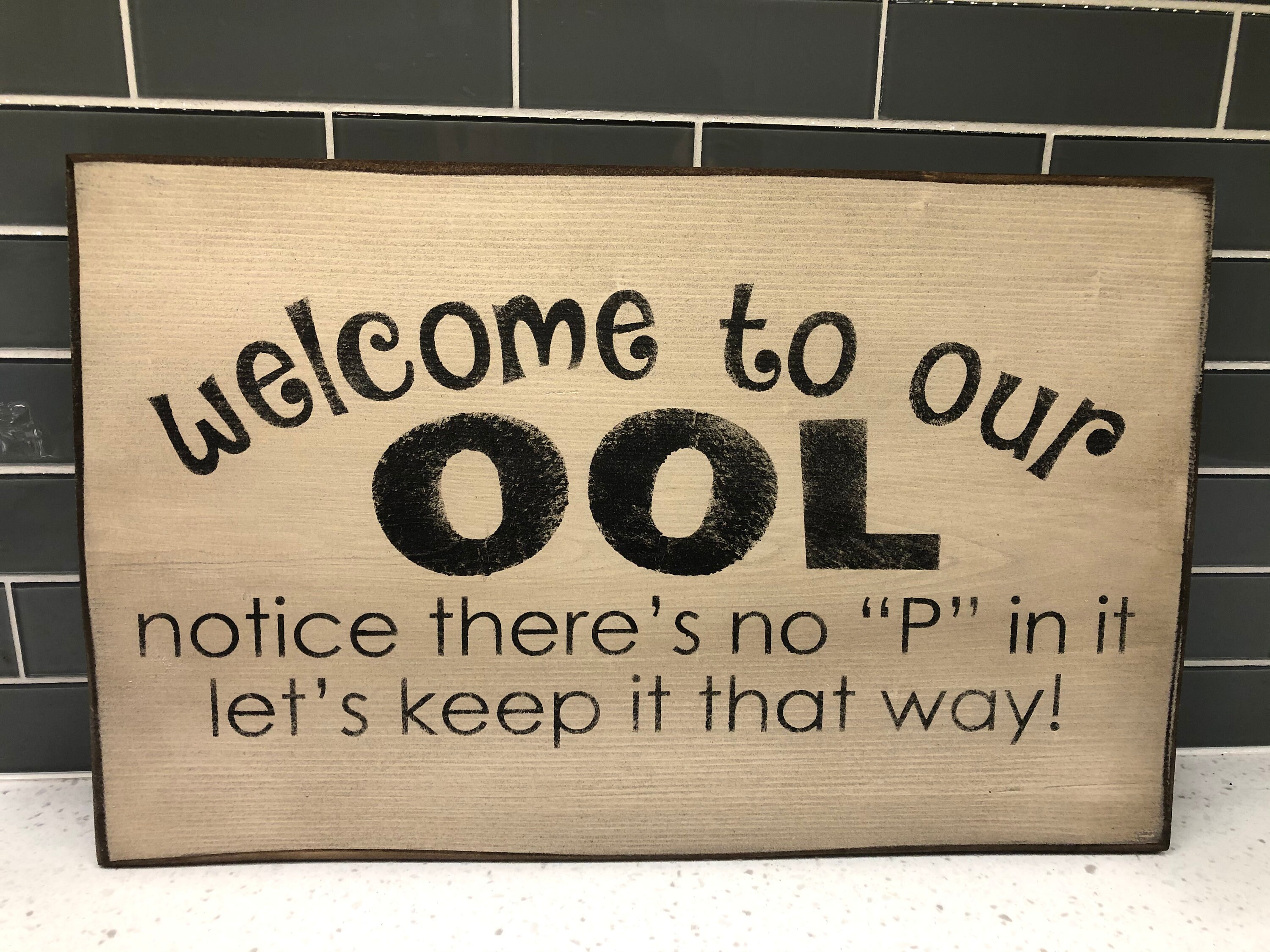 to our Ool sign Etsy