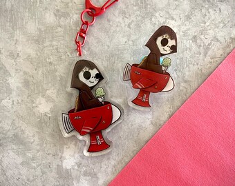 Rocket Grimm - Keychain and Acrylic Pin - Grim Reaper Halloween Dark Fantasy Cartoon