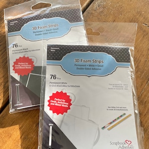 May include: Two packages of 3D foam strips, one black and one white. Each package contains 76 strips that are 3 inches long and 0.08 inches thick. The strips are perfect for cards, invitations, and mixed media.
