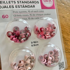 May include: A package of 60 pink eyelets, 15 of each color, for use with a Crop-A-Dile. The eyelets are 3/16 inch (0.5 cm) in size.