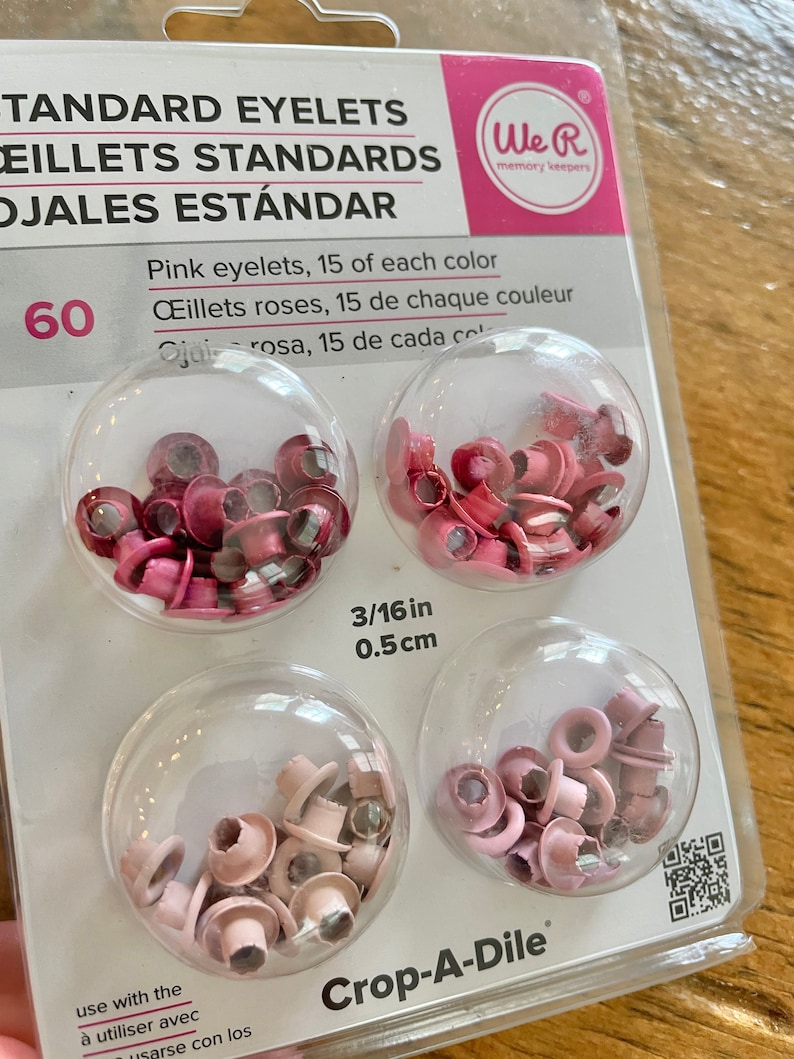 May include: A package of 60 pink eyelets, 15 of each color, for use with a Crop-A-Dile. The eyelets are 3/16 inch (0.5 cm) in size.