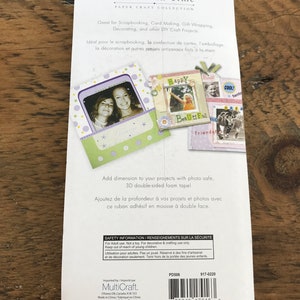 May include: A package of 3D double-sided foam tape for scrapbooking, card making, gift wrapping, decorating, and other DIY craft projects. The package features a photo of a girl with a happy expression and the text "Happy Beautiful Friends".