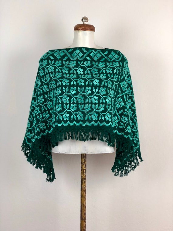 Hand Woven Mexican Poncho with embroidered flower