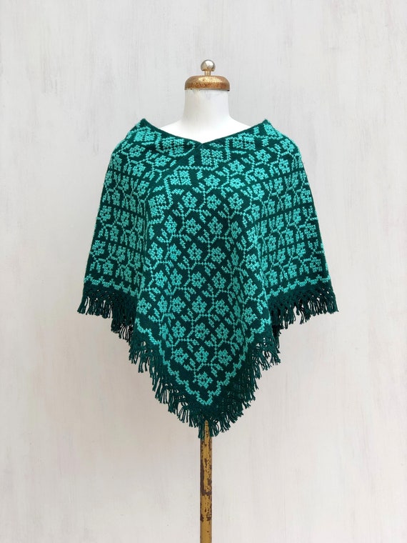 Hand Woven Mexican Poncho with embroidered flower
