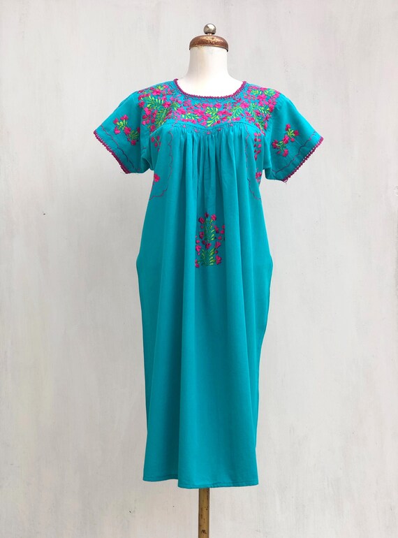Mexican dress with hand embroidered flowers, mexic