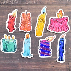 May include: A set of nine colorful hand-drawn candle illustrations. The candles are in various shapes and sizes, including a tall, thin candle, a short, wide candle, and a candle with a drip. The candles are all lit and have flames.