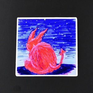 May include: A red, furry creature with a tail and large ears sits against a blue background with white stars. The creature is facing away from the viewer and has a slightly menacing look.