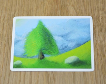 Evergreen tree under a cloudy sky landscape vinyl sticker