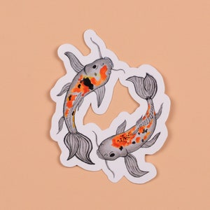 May include: Two grey and orange koi fish swimming in a circle, illustrated in a watercolor style.