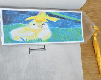 Demure baby chick with a daffodil flower hat bookmark, pet bird wildlife animal page holder with tassel, book accessory