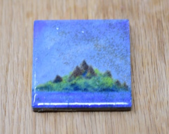 Peaceful mountainous deserted island ceramic tile magnet