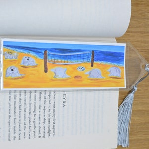 Ghost friends playing volleyball on the beach bookmark, creepy spirit page holder with tassel, spooky Halloween book accessory