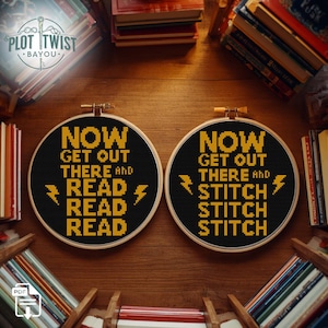 May include: Two circular wooden embroidery hoops containing black fabric with yellow cross-stitched text. The left hoop reads: NOW GET OUT THERE AND READ READ READ. The right hoop reads: NOW GET OUT THERE AND STITCH STITCH STITCH. Both feature yellow lightning bolts.
