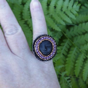 Purple and Bronze Peaceful Sleeping Face Motif Beaded Ring with Adjustable Stainless Steel Band