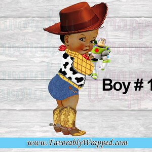 May include: A brown-skinned baby boy dressed as a cowboy with a brown cowboy hat, blue jeans, and a yellow and black plaid shirt. He is holding a toy Buzz Lightyear from the Toy Story movie franchise. The text "Boy #1" is written in black letters on a white background.