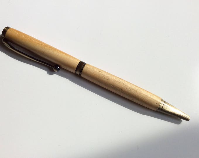 Handcrafted Cherrywood pen with antique polished bronze fittings
