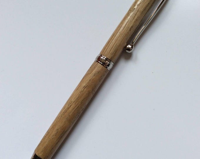 Handcrafted Oak pen with platinum metal finish