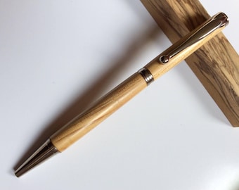 Handcrafted Cedar wood pen with platinum metal finish