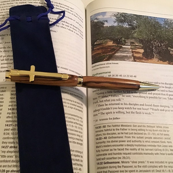 Handcrafted ballpoint pen made from olive tree wood from Bethlehem and finished with gold cross clip.