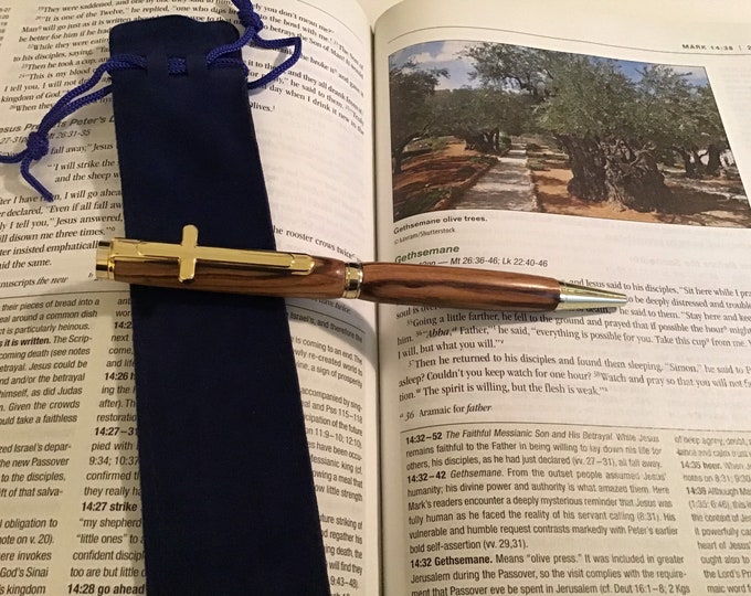 Handcrafted ballpoint pen made from olive tree wood from Bethlehem and finished with gold cross clip.