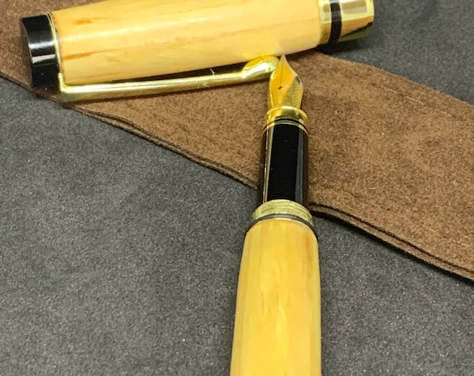 Handcrafted fountain pen in British Willow wood finished in gold fittings