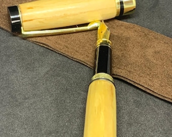 Handcrafted fountain pen in British Willow wood finished in gold fittings
