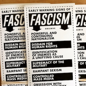 The "Early Warning Signs of Fascism" sticker
