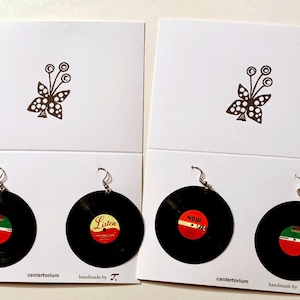 2 pairs mini vinyl record earrings;   2 matched earrings, 2 with random labels