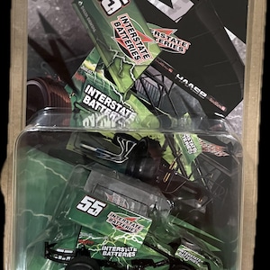 May include: A 1:50 scale die-cast collectible model of a green race car with black wheels. The car has the number 55 on the side and is sponsored by Interstate Batteries.