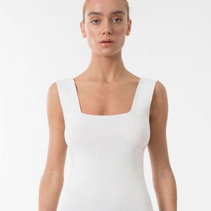 The white sleeveless top blouse