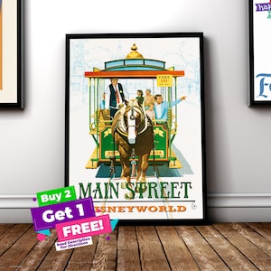 May include: Vintage poster print featuring a horse-drawn trolley on Main Street at Disneyworld. The poster has a green and gold trolley with passengers and the text "Main Street Disneyworld". The poster is framed in black.