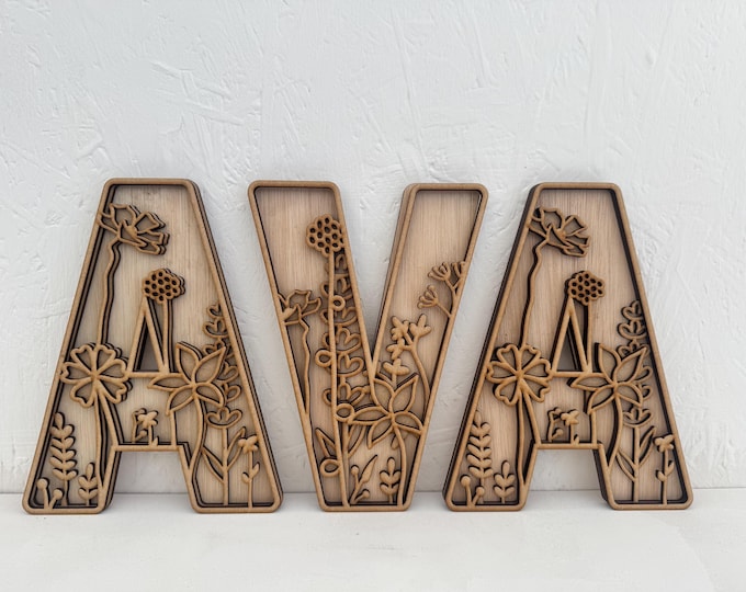 Botanical baby name wall art Wooden baby name wall sign Woodland nursery name letters Engraved wooden baby name Nature inspired baby decor