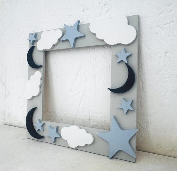 Handmade wooden light switch cover with moons, stars and clouds – the perfect nursery wall plate and galaxy room decor for a boys bedroom