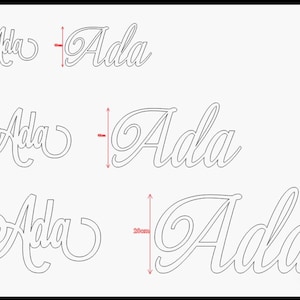 May include: A selection of laser-cut wooden name signs spelling "Ada" in a cursive font. The signs vary in size, with heights of 10mm, 15mm, and 20cm. The name is displayed in a decorative, flowing script, ideal for personalized decor.