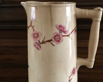 Very old antique pottery pitcher style wild rose design, decoration only