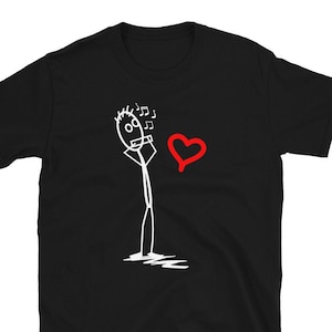 May include: Black t-shirt with a white stick figure playing a musical instrument and a red heart.