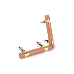 May include: Two brown wooden cabinet knobs with gold accents. The knobs are attached to screws and are in an L-shape.