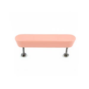 May include: A pale pink cabinet pull with a rectangular form and rounded edges. It is mounted on two silver screws. The hardware is set against a white background.