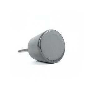 May include: A grey cabinet knob with a cylindrical body and a flat, circular face. A threaded metal rod extends from the back for attachment. The knob is a solid, smooth colour and appears to be made of metal or a similar material.
