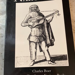 May include: Black and white illustration of a man playing a stringed instrument. The book cover features the title "NARCISSISM" and the names of the authors: Charles Boer, Tom Cheetham, Enrique Pardo, Anais Spitzer, and et al.