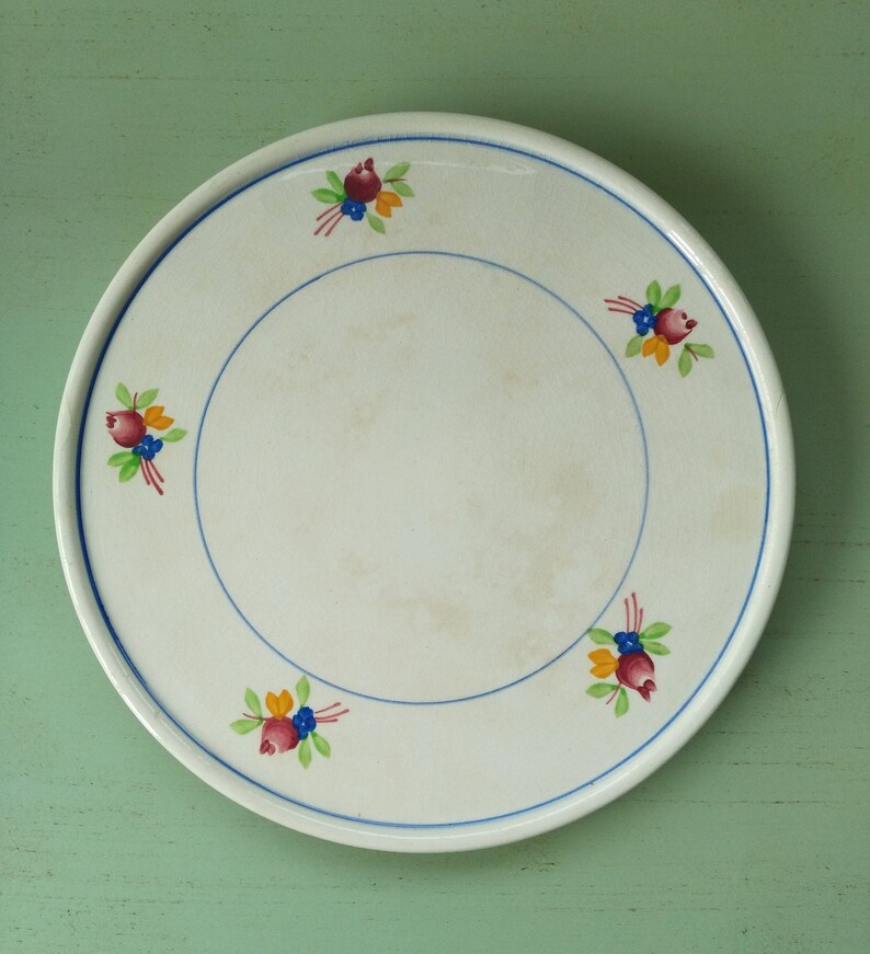 Dessous plat faïence de Longwy, décor floral , N°1 - Acolytes Antique