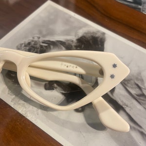 Spectacular and unique cat-eye glasses late 50&#39;s-early 60&#39;s Original in cream- Made in France - Deadstock (never worn)